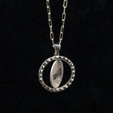 WILD | SAFE COIN FLIP PENDANT