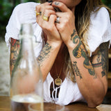 WILD | FREE COIN FLIP PENDANT